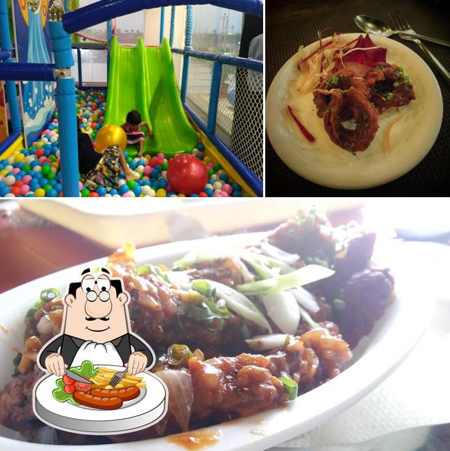 Take a look at the photo displaying food and play area at E-Square Elements