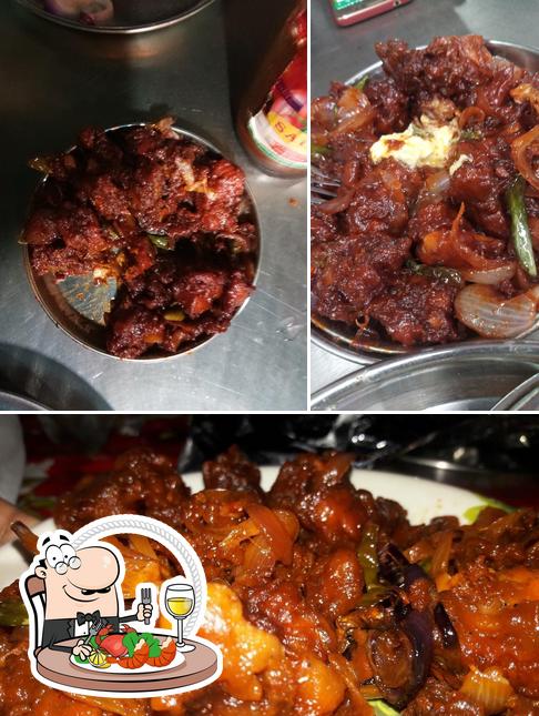 Get seafood at Golu Hotel