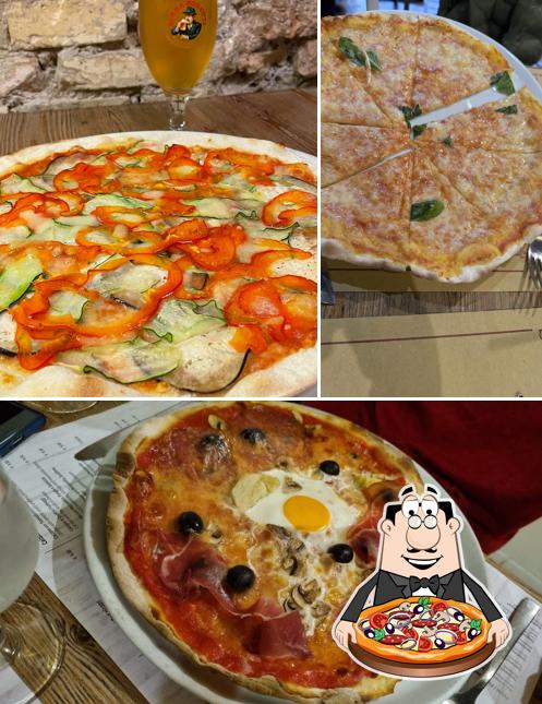 A Trattoria Pizzeria Il Girasole, puoi provare una bella pizza
