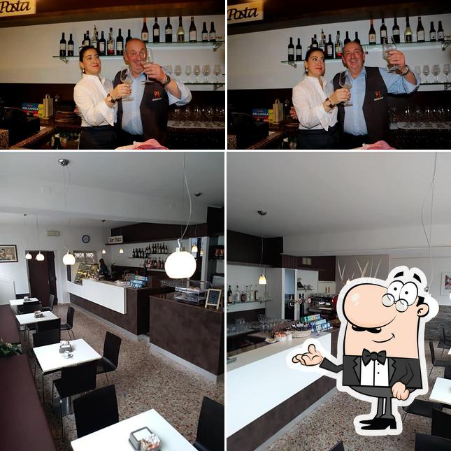 La interni e bancone da bar del ristorante