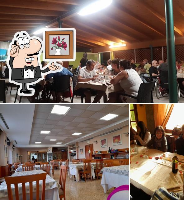 Siediti a un tavolo di Ristorante pizzeria La Villa dei Pini