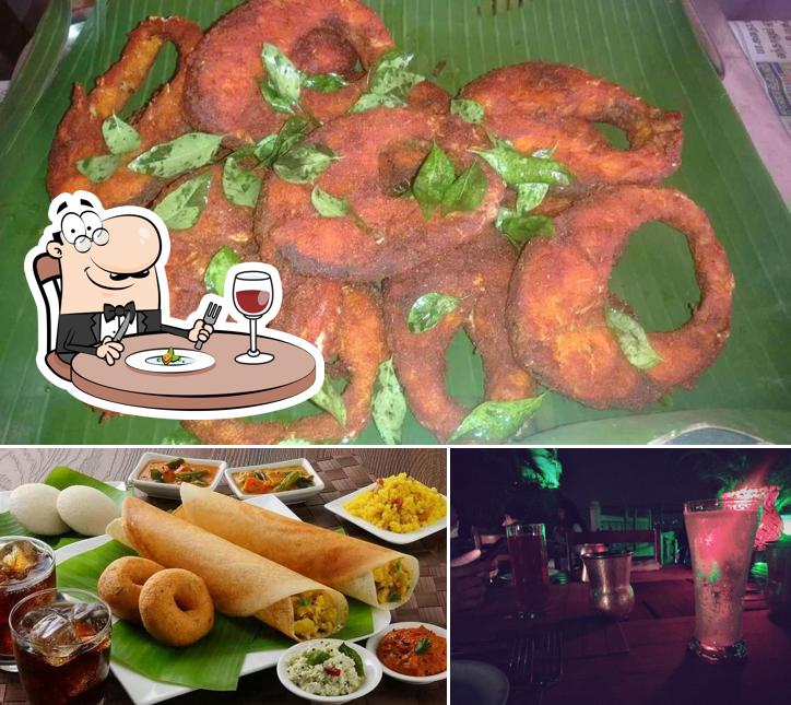 This is the photo depicting food and beer at VMS Star Biryani