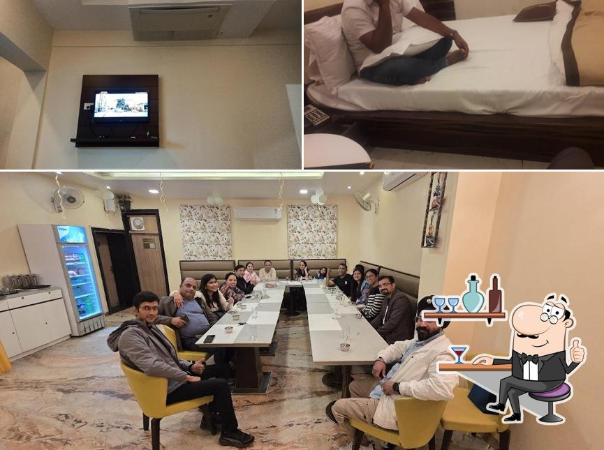 Take a seat at one of the tables at Hotel Bharat