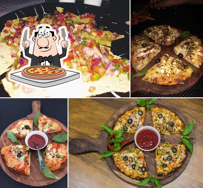 Try out pizza at Elite kitchen lounge bar Rooftop bar in Jaipur