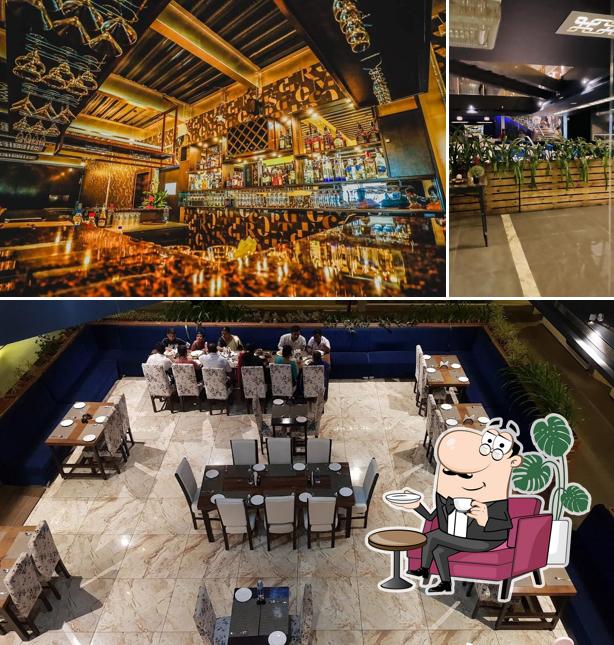 Among various things one can find interior and bar counter at Rigaan Resto bar