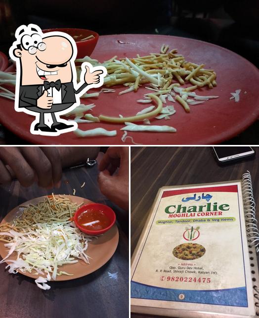 Look at this image of Charlie Moghlai Corner