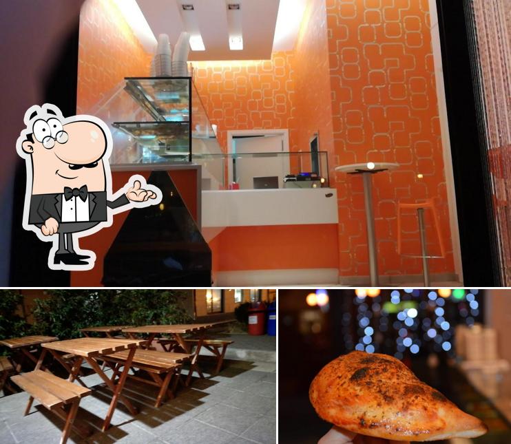 La immagine della interni e cibo di Un Girotondo di Pizza Aquarium