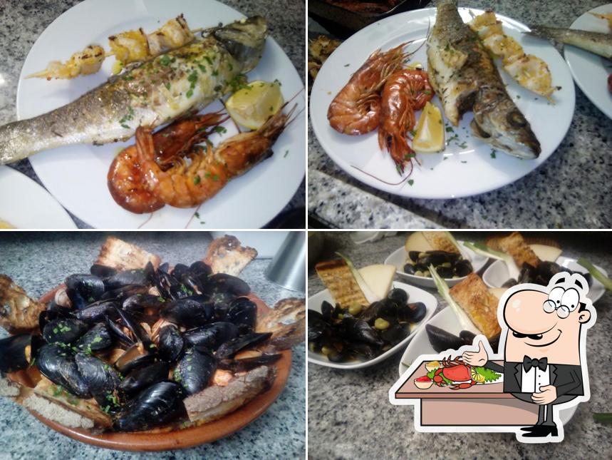 Prenditi tra i molti pasti di mare offerti a Degustibus bar ristorante pizzeria