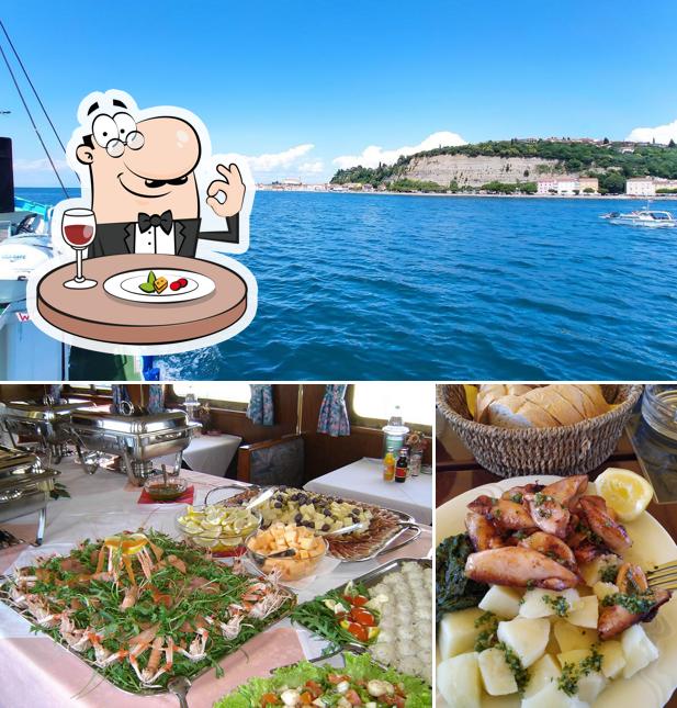 Questa è la immagine che mostra la cibo e esterno di Ladja Laho Portorož