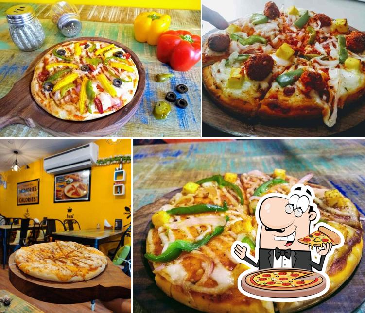 Get pizza at Helly & Chilly - The Premium Cafe