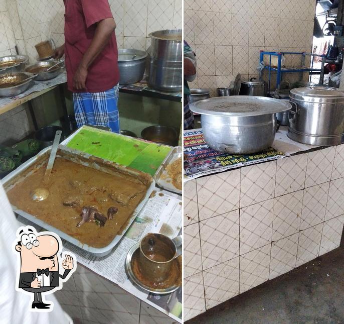 Look at this photo of Rajendran Hotel