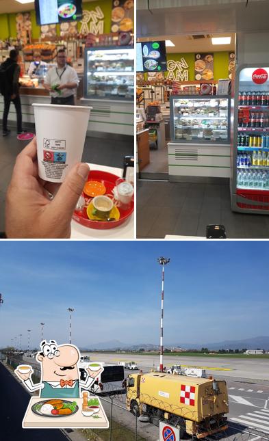 Questa è la immagine che presenta la cibo e esterno di GNAM aeroporto