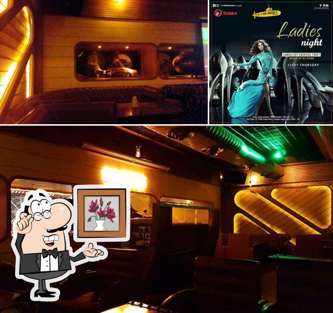 Take a seat at one of the tables at The Submarine Lounge