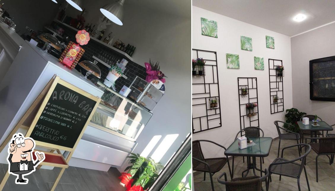 Dai un'occhiata agli interni di Aroma Bar