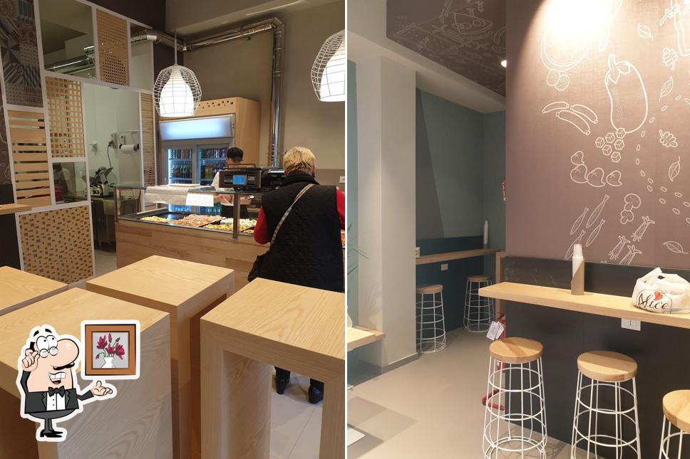 Dai un'occhiata agli interni di Alice Pizza Via Tiburtina