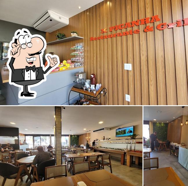 Sente em uma das mesas no X Picanha Restaurante - Caieiras (SP)