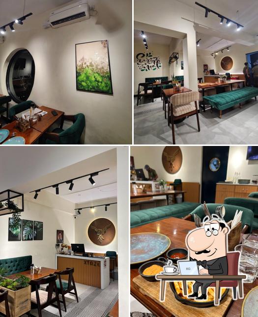 Take a seat at one of the tables at Xtaze Restro Cafe