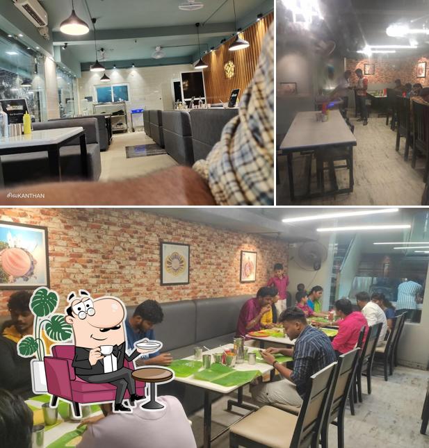 Take a seat at one of the tables at JKANS Foods