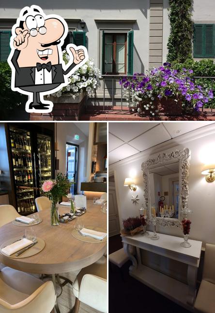 Siediti a un tavolo di FH55 Hotel Villa Fiesole