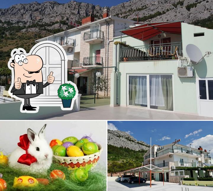 Guarda la foto che raffigura la esterno e cibo di Gostionica "Šampion"