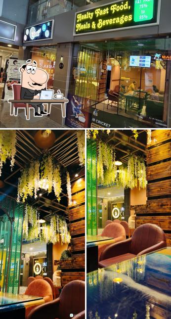 Take a seat at one of the tables at Pcafe
