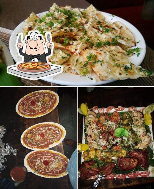 Try out pizza at Kaveri Sea Food