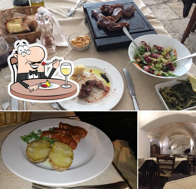 Dai un’occhiata alla foto che presenta la cibo e tavolo da pranzo di Le Botteghe Nuova Gestione