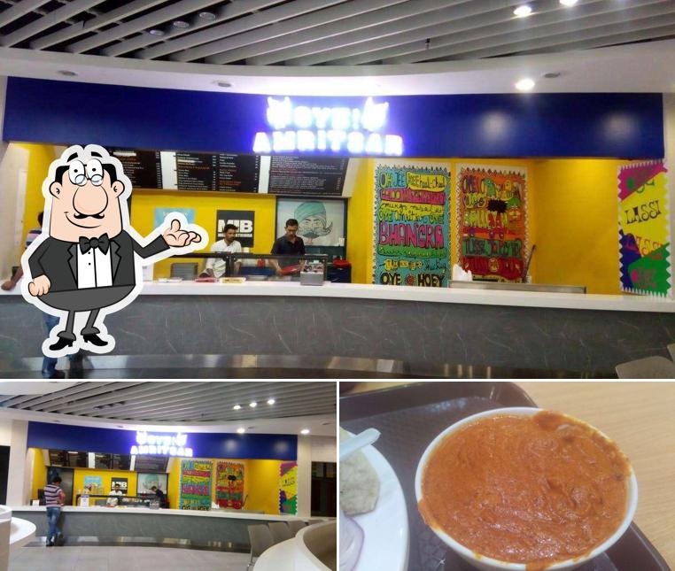 This is the image displaying interior and food at Oye Amritsar