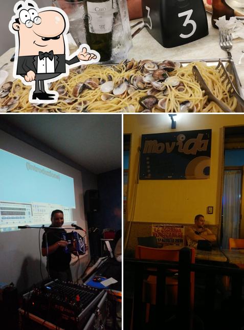 Questa è la foto che mostra la interni e frutti di mare di Pizzeria Movida
