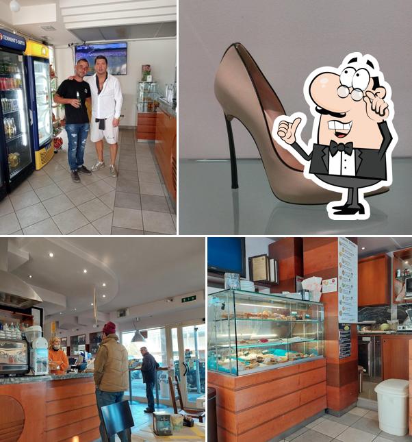 Dai un'occhiata agli interni di Bar Rubicone