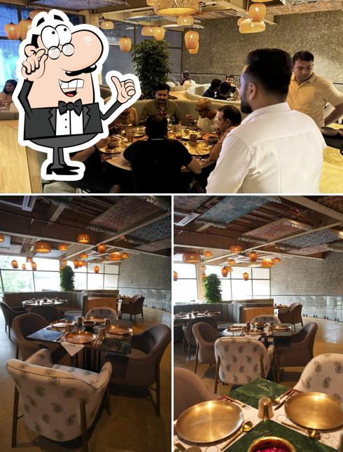 Take a seat at one of the tables at Sandook at Siguiente