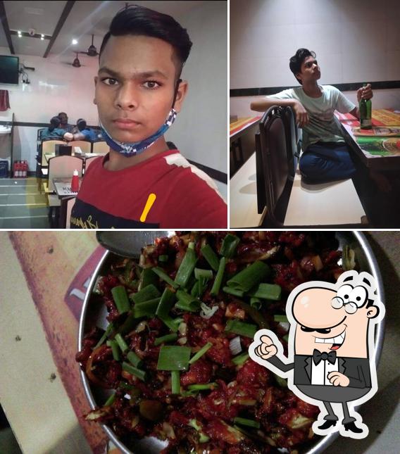 The photo of South Canara Restaurant & Bar’s interior and pizza