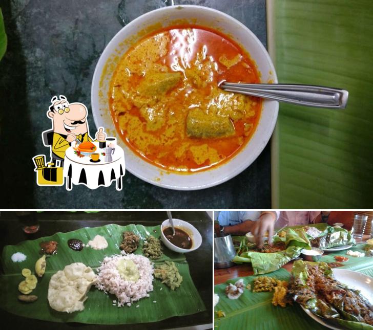 The picture of food and dining table at Kettuvallam