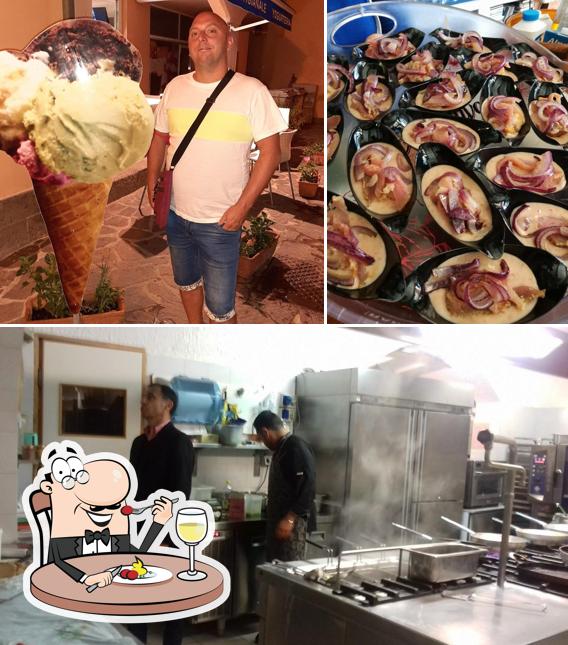 Dai un’occhiata alla immagine che mostra la cibo e interni di Yachting Bar