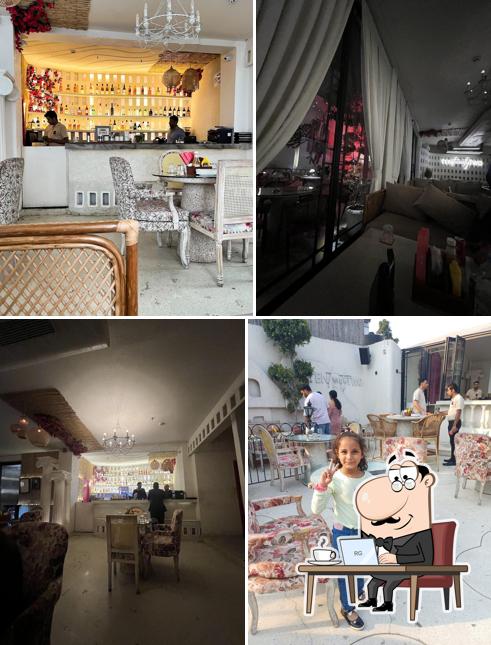 Take a seat at one of the tables at 1022 Cafe, Delhi