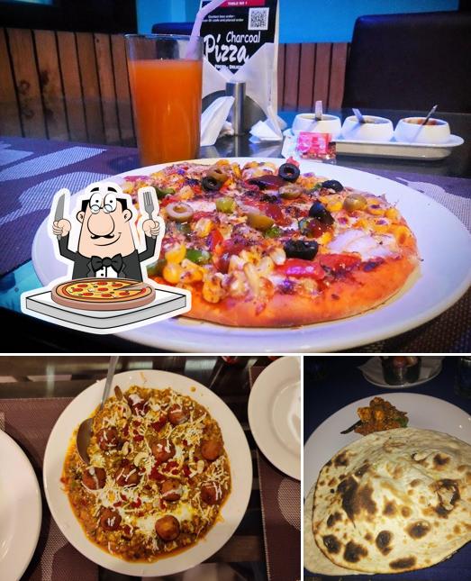Pick pizza at Cosmic Grill restaurant