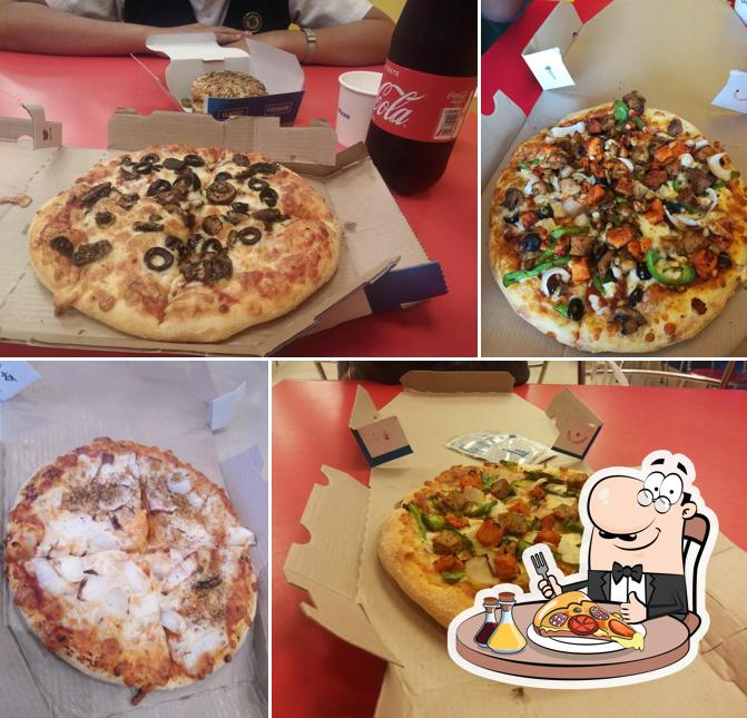 Pick pizza at Domino's Pizza Kozhikode , Kerala