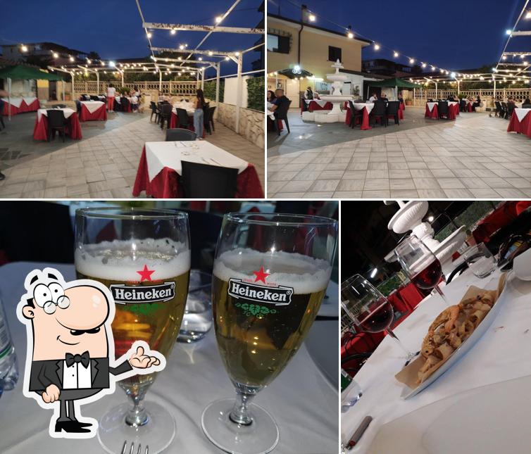 La foto della interni e bevanda di La Location Del Serendipity