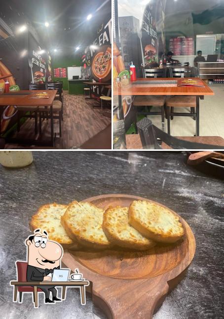 The image of Pan Pizza’s interior and food
