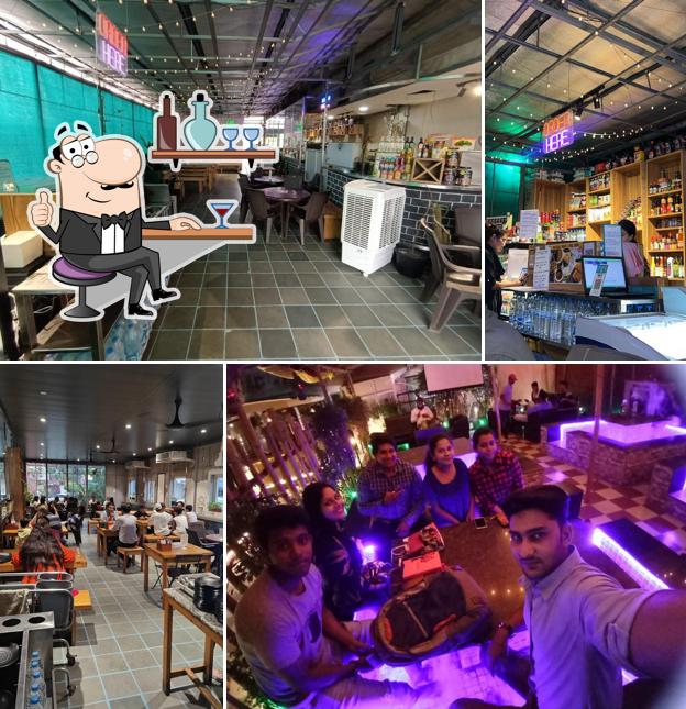 Take a seat at one of the tables at Cafe Junoon