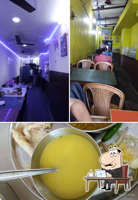 This is the photo displaying interior and food at Chandan Hotel