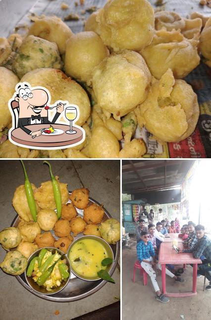 The image of food and dining table at Keshar Bhavani Nasta House