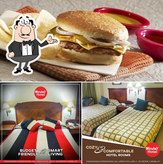Check out the image showing interior and burger at Nirula's WTT