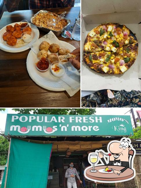 This is the image depicting food and exterior at The Momos Wiings