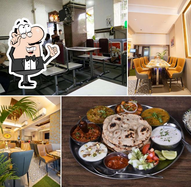 Take a seat at one of the tables at Suprabhaat Restaurant