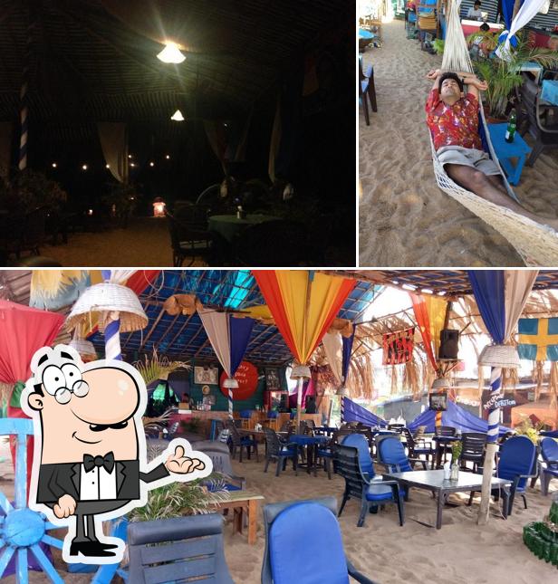 Take a seat at one of the tables at Fishermans Paradise