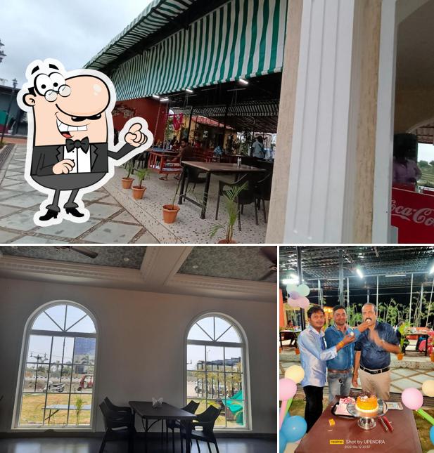 The picture of Amrit Pure Veg - The Urban Dhaba’s interior and dessert