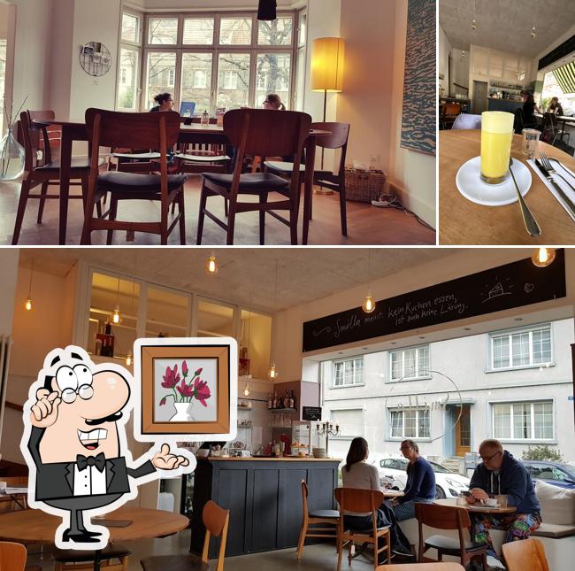 Dai un'occhiata agli interni di Smilla Café