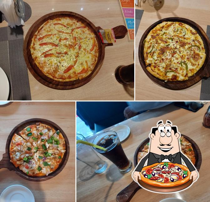 Try out pizza at Pizza Cafe