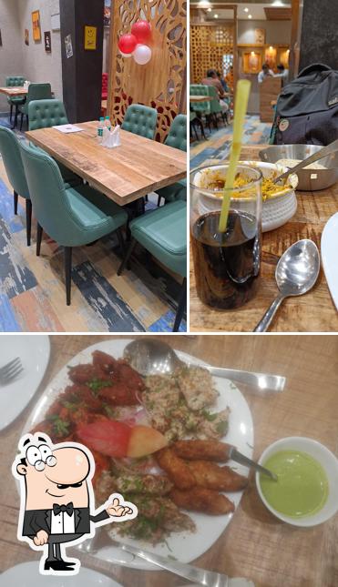 Take a look at the image showing interior and food at Augusta Restaurant & Cafe - Best Restaurant in Siwan